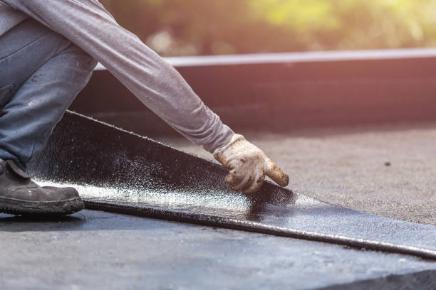 Professional Basement Waterproofing technician working in Maysville, KY